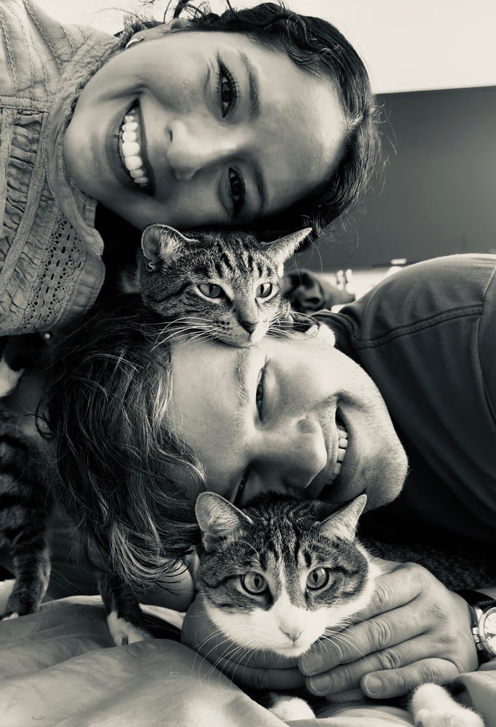 Paula and Felix at home with their two cats