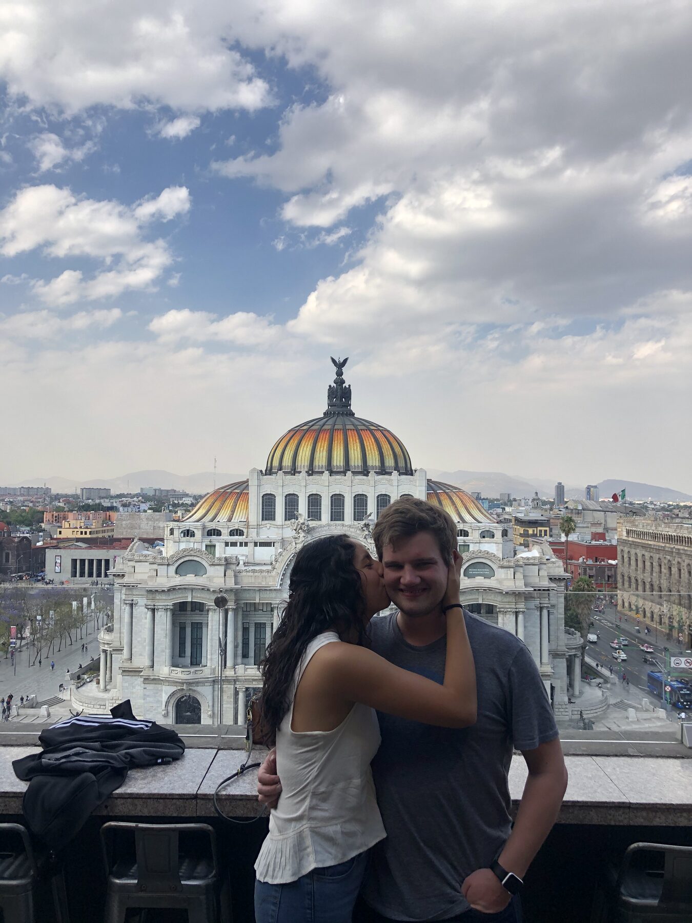 Paula and Felix overlooking a city